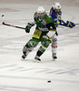 Igor Cvetek (4) of HDD Telemach Olimpija and Benjamin Petrik (21) of EC VSV during match of EBEL league Ice hockey tournament between HDD Telemach Olimpija and EC VSV, Villach. Match between HDD Telemach Olimpija and EC VSV, Villach was held in Ljubljana Hala Tivoli arena, Slovenia, on Friday, 16th of November 2012.
