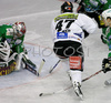 Harald Ofner (no.47) of HC TWK Innsbruck (M) infront of goalie Alex Westlund (no.30) of ZM Olimpija (L) during match of 46th round of EBEL League between ZM Olimpija, Ljubljana, Slovenia and HC TWK Innsbruck, Austria. Match was won by ZM Olimpija who defeated HC TWK Innsbruck with 5:2. Match was played in Tivoli Arena in Ljubljana, Slovenia on 3rd of February 2008.

