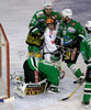 i28 (M) squeezed between Greg Kuznik (no.22) of ZM Olimpija (L) and Kevin Mitchell (no.2) of ZM Olimpija (R) while goalie Alex Westlund (no.30) of ZM Olimpija (M) covering puck during match of 46th round of EBEL League between ZM Olimpija, Ljubljana, Slovenia and HC TWK Innsbruck, Austria. Match was won by ZM Olimpija who defeated HC TWK Innsbruck with 5:2. Match was played in Tivoli Arena in Ljubljana, Slovenia on 3rd of February 2008.

