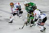 Tomaz Vnuk (no.24) of ZM Olimpija (M) attacking between i28 (L) and Marko Makinen (no.23) of HC TWK Innsbruck (R) during match of 46th round of EBEL League between ZM Olimpija, Ljubljana, Slovenia and HC TWK Innsbruck, Austria. Match was won by ZM Olimpija who defeated HC TWK Innsbruck with 5:2. Match was played in Tivoli Arena in Ljubljana, Slovenia on 3rd of February 2008.
