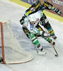 Tomaz Vnuk (no.24) of ZM Olimpija (L) and Winfried Rac (no.87) of EHC Black Wings Linz (R) behind goal of EHC Black Wings Linz during second half finals match of EBEL League between ZM Olimpija, Ljubljana, Slovenia and EHC Black Wings Linz, Austria. Match was won by ZM Olimpija who defeated EHC Black Wings Linz with 3:2. Match was played in Tivoli Arena in Ljubljana, Slovenia on 28th of February 2008.
