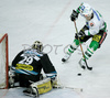 Egon Muric (no.15) of ZM Olimpija (R) infront of goalie Jurgen Penker (no.29) of EHC Black Wings Linz (L) during second half finals match of EBEL League between ZM Olimpija, Ljubljana, Slovenia and EHC Black Wings Linz, Austria. Match was won by ZM Olimpija who defeated EHC Black Wings Linz with 3:2. Match was played in Tivoli Arena in Ljubljana, Slovenia on 28th of February 2008.
