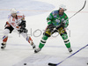Todd Elik (no.12) of ZM Olimpija (M) between Paul Healey (no.16) of HK Acroni Jesenice (R) and j during third match of Slovenian National Championships finals between ZM Olimpija, Ljubljana, Slovenia and HK Acroni Jesenice, Slovenia. Match was won by Acroni Jesenice who defeated ZM Olimpija with 1:2. Match was played in Tivoli Arena in Ljubljana, Slovenia on 8th of April 2008.
