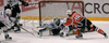 Marjan Manfreda (no.18) of HK Acroni Jesenice (R) scoring during match of Erste Bank Eishockey Liga 2008-09 between HK Acroni Jesenice, Jesenice, Slovenia and HDD Tilia Olimpija, Ljubjana, Slovenia. HK Acroni Jesenice won match and defeated HDD Tilia Olimpija 8:2. Match of EBEL League was played in Podmezaklja arena in Jesenice, Slovenia on 12th of October 2008.
