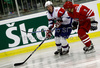 Ziga Jeglic (no.8) of Slovenia (L) and Pawel Skrzypkowski (no.2) of Poland (R) during ice hockey match of IIHF Ice hockey World championships Division I, group B between Slovenia and Poland. Match between Slovenia and Poland of IIHF Ice hockey World championships Division I, group B was held on Saturday, 17th of April 2010 in Ljubljana, Slovenia. Slovenia defeated Poland with 3-2.
