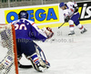 Colin Shields (no.19) of Great Britain shooting during ice hockey match of IIHF Ice hockey World championships Division I, group B between Great Britain and Korea. Match between Great Britain and Korea of IIHF Ice hockey World championships Division I, group B was held on Sunday, 18th of April 2010 in Ljubljana, Slovenia.
