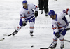 Robert Dowd (no.12) of Great Britain (L) and Greg Chambers (no.24) of Great Britain (R) during ice hockey match of IIHF Ice hockey World championships Division I, group B between Great Britain and Korea. Match between Great Britain and Korea of IIHF Ice hockey World championships Division I, group B was held on Sunday, 18th of April 2010 in Ljubljana, Slovenia.
