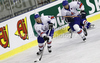 Robert Dowd (no.12) of Great Britain (L) and Ashley Tait (no.21) of Great Britain (R) during ice hockey match of IIHF Ice hockey World championships Division I, group B between Great Britain and Korea. Match between Great Britain and Korea of IIHF Ice hockey World championships Division I, group B was held on Sunday, 18th of April 2010 in Ljubljana, Slovenia.
