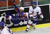 Greg Kuznik (no.18) of Slovenia (L) and Matt Myers (no.8) of Great Britain (R) during ice hockey match of IIHF Ice hockey World championships Division I, group B between Great Britain and Slovenia. Match between Great Britain and Slovenia of IIHF Ice hockey World championships Division I, group B was held on Tuesday, 20th of April 2010 in Ljubljana, Slovenia.
