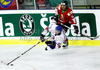 Ben OConnor (no.27) of Great Britain (L) is getting tripped by Daniel Koger (no.16) of Hungary (R) during ice hockey match of IIHF Ice hockey World championships Division I, group B between Great Britain and Hungary. Match between Great Britain and Hungary of IIHF Ice hockey World championships Division I, group B was held on Wednesday, 21st of April 2010 in Ljubljana, Slovenia.
