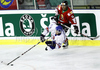 Ben OConnor (no.27) of Great Britain (L) is getting tripped by Daniel Koger (no.16) of Hungary (R) during ice hockey match of IIHF Ice hockey World championships Division I, group B between Great Britain and Hungary. Match between Great Britain and Hungary of IIHF Ice hockey World championships Division I, group B was held on Wednesday, 21st of April 2010 in Ljubljana, Slovenia.

