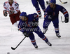 Colin Shields (no.19) of Great Britain (M), Greg Chambers (no.24) of Great Britain (R) and Jakub Rzeszutko (no.14) of Poland (L) during ice hockey match of IIHF Ice hockey World championships Division I, group B between Great Britain and Poland. Match between Great Britain and Poland of IIHF Ice hockey World championships Division I, group B was held on Friday, 23rd of April 2010 in Ljubljana, Slovenia.
