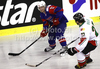 Jan Mursak (no.13) of Slovenia (L) and Tamas Sille (no.27) of Hungary (R) during ice hockey match of IIHF Ice hockey World championships Division I, group B between Slovenia and Hungary. Match between Slovenia and Hungary of IIHF Ice hockey World championships Division I, group B was held on Friday, 23rd of April 2010 in Ljubljana, Slovenia.
