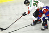 Krisztian Palkovics (no.24) of Hungary (L) and Andrej Tavzelj (no.4) of Slovenia (R) during ice hockey match of IIHF Ice hockey World championships Division I, group B between Slovenia and Hungary. Match between Slovenia and Hungary of IIHF Ice hockey World championships Division I, group B was held on Friday, 23rd of April 2010 in Ljubljana, Slovenia.
