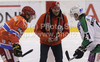 Alpine skier Kalle Palander of Finland (M) throwing first puck to his countrymen Toni Dahlman of HK Acroni Jesenice (L) and Tomi Mustonen of HDD Tilia Olimpija (R) before start of match of EBEL Ice hockey league between HK Acroni Jesenice, Slovenia, and HDD Tilia Olimpija, Ljubljana, Slovenia. Match between HK Acroni Jesenice and Tilia Olimpija was played in Podmezakla hall in Jesenice, Slovenia, on Saturday, 1st of January 2011.
