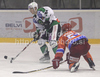 John Hughes of HDD Tilia Olimpija (L) and Mitja Robar HK Acroni Jesenice (R) during match of EBEL Ice hockey league between HK Acroni Jesenice, Slovenia, and HDD Tilia Olimpija, Ljubljana, Slovenia. Match between HK Acroni Jesenice and Tilia Olimpija was played in Podmezakla hall in Jesenice, Slovenia, on Saturday, 1st of January 2011.
