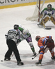 Matt Higgins of HDD Tilia Olimpija (L), Rok Ticar HK Acroni Jesenice (R) and Goalkeeper Matija Pintaric of HDD Tilia Olimpija during match of EBEL Ice hockey league between HK Acroni Jesenice, Slovenia, and HDD Tilia Olimpija, Ljubljana, Slovenia. Match between HK Acroni Jesenice and Tilia Olimpija was played in Podmezakla hall in Jesenice, Slovenia, on Saturday, 1st of January 2011.
