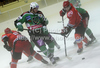 Miha Verlic of Tilia Olimpija (M) between Tomo Hafter (L) and Marjan Manfreda of Acroni Jesenice (R) during ice hockey match Summer League Rudi Hiti (Poletna liga Rudi Hiti) 2011 between HDD Tilia Olimpija and HK Acroni Jesenice. Match between HDD Tilia Olimpija and HK Acroni Jesenice was held on Friday, 19th of August 2011 in Bled, Slovenia.
