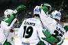 Ziga Pance (no.19) of HDD Tilia Olimpija (M) celebrating his goal with teammates during ice hockey match of EBEL league 2011-2012 between HK Acroni Jesenice and HDD Tilia Olimpija. Match between HK Acroni Jesenice and HDD Tilia Olimpija was held on Monday, 26th of December 2011 in Jesenice, Slovenia.
