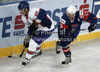 Mark Thomas (no.22) of Great Britain and Marcel Rodman (no.22) of Sloveniaduring match of IIHF Ice hockey World championship Division 1 Group A between Slovenia and Great Britain. Match between Slovenia and Great Britain of IIHF Ice hockey World championship Division 1 Group A was held in Stozice Arena in Ljubljana, Slovenia, on Sunday, 15th of April 2012.

