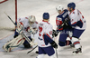 Stephen Murphy (no.1) of Great Britain, Robert Dowd (no.12) of Great Britain, Andrej Hebar (no.21) of Slovenia during match of IIHF Ice hockey World championship Division 1 Group A between Slovenia and Great Britain. Match between Slovenia and Great Britain of IIHF Ice hockey World championship Division 1 Group A was held in Stozice Arena in Ljubljana, Slovenia, on Sunday, 15th of April 2012.
