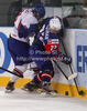 Marcel Rodman (no.22) of Slovenia (R) and Matthew Myers (no.8) of Great Britain (L) during match of IIHF Ice hockey World championship Division 1 Group A between Slovenia and Great Britain. Match between Slovenia and Great Britain of IIHF Ice hockey World championship Division 1 Group A was held in Stozice Arena in Ljubljana, Slovenia, on Sunday, 15th of April 2012.
