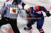 Marcel Rodman (no.22) of Slovenia fighting for puck during match of IIHF Ice hockey World championship Division 1 Group A between Slovenia and Great Britain. Match between Slovenia and Great Britain of IIHF Ice hockey World championship Division 1 Group A was held in Stozice Arena in Ljubljana, Slovenia, on Sunday, 15th of April 2012.
