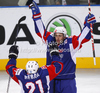 Scorer Tomaz Razingar (no.9) of Slovenia (R) and Andrej Hebar (no.21) of Slovenia celebrate third goal during match of IIHF Ice hockey World championship Division 1 Group A between Slovenia and Great Britain. Match between Slovenia and Great Britain of IIHF Ice hockey World championship Division 1 Group A was held in Stozice Arena in Ljubljana, Slovenia, on Sunday, 15th of April 2012.
