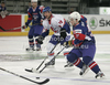 Rok Pajic (no.27) of Slovenia (R) and Colin Shields (no.19) of Great Britain (L) during match of IIHF Ice hockey World championship Division 1 Group A between Slovenia and Great Britain. Match between Slovenia and Great Britain of IIHF Ice hockey World championship Division 1 Group A was held in Stozice Arena in Ljubljana, Slovenia, on Sunday, 15th of April 2012.
