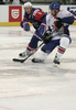 David Phillips (no.13) of Great Britain (R) and Tomaz Razingar (no.9) of Slovenia (L) during match of IIHF Ice hockey World championship Division 1 Group A between Slovenia and Great Britain. Match between Slovenia and Great Britain of IIHF Ice hockey World championship Division 1 Group A was held in Stozice Arena in Ljubljana, Slovenia, on Sunday, 15th of April 2012.
