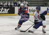 David Phillips (no.13) of Great Britain (R) and Tomaz Razingar (no.9) of Slovenia (L) during match of IIHF Ice hockey World championship Division 1 Group A between Slovenia and Great Britain. Match between Slovenia and Great Britain of IIHF Ice hockey World championship Division 1 Group A was held in Stozice Arena in Ljubljana, Slovenia, on Sunday, 15th of April 2012.
