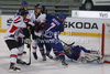 Thomas Raffl (no.5) of Austria in front of goalie Stephen Murphy (no.1) of Great Britain, surrounded by Thomas Hundertpfund (no.27) of Austria (L)  and Jason Hewitt (no.7) of Great Britain (R) during match of IIHF Ice hockey World championship Division 1 Group A between Austria and Great Britain. Match between Austria and Great Britain of IIHF Ice hockey World championship Division 1 Group A was held in Stozice Arena in Ljubljana, Slovenia, on Monday, 16th of April 2012.

