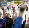 Spectators celebrating Slovenian goal during match of IIHF Ice hockey World championship Division 1 Group A between Slovenia and Hungary. Match between Slovenia and Hungary of IIHF Ice hockey World championship Division 1 Group A was held in Stozice Arena in Ljubljana, Slovenia, on Wednesday, 18th of April 2012.
