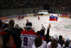 Spectators celebrating goal of Slovenian team during match of IIHF Ice hockey World championship Division 1 Group A between Slovenia and Hungary. Match between Slovenia and Hungary of IIHF Ice hockey World championship Division 1 Group A was held in Stozice Arena in Ljubljana, Slovenia, on Wednesday, 18th of April 2012.
