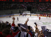 Spectators celebrating goal of Slovenian team during match of IIHF Ice hockey World championship Division 1 Group A between Slovenia and Hungary. Match between Slovenia and Hungary of IIHF Ice hockey World championship Division 1 Group A was held in Stozice Arena in Ljubljana, Slovenia, on Wednesday, 18th of April 2012.

