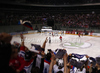 Spectators celebrating goal of Slovenian team during match of IIHF Ice hockey World championship Division 1 Group A between Slovenia and Hungary. Match between Slovenia and Hungary of IIHF Ice hockey World championship Division 1 Group A was held in Stozice Arena in Ljubljana, Slovenia, on Wednesday, 18th of April 2012.
