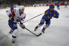 David Rodman (no.12) of Slovenia (L) and Yuriy Navarenko (no.2) of Ukraine  (R) during match of IIHF Ice hockey World championship Division 1 Group A between Slovenia and Ukrain. Match between Slovenia and Ukrain of IIHF Ice hockey World championship Division 1 Group A was held in Stozice Arena in Ljubljana, Slovenia, on Thursday, 19th of April 2012.
