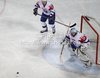 Goalie Robert Kristan (no.30) of Slovenia (R) saving his goal from shot of Ukraine player during match of IIHF Ice hockey World championship Division 1 Group A between Slovenia and Ukrain. Match between Slovenia and Ukrain of IIHF Ice hockey World championship Division 1 Group A was held in Stozice Arena in Ljubljana, Slovenia, on Thursday, 19th of April 2012.

