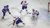 Goalie Robert Kristan (no.30) of Slovenia (R) saving his goal from shot of Oleksandr Materukhin (no.17) of Ukraine (L) during match of IIHF Ice hockey World championship Division 1 Group A between Slovenia and Ukrain. Match between Slovenia and Ukrain of IIHF Ice hockey World championship Division 1 Group A was held in Stozice Arena in Ljubljana, Slovenia, on Thursday, 19th of April 2012.
