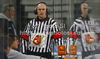 Referee Eduards Odins waiting for TV check on possible goal during match of IIHF Ice hockey World championship Division 1 Group A between Great Britain and Hungary. Match between Great Britain and Hungary of IIHF Ice hockey World championship Division 1 Group A was held in Stozice Arena in Ljubljana, Slovenia, on Saturday, 21st of April 2012.
