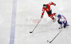 Robert Dowd (no.12) of Great Britain (R) and Istvan Bartalis (no.28) of Hungary (L) during match of IIHF Ice hockey World championship Division 1 Group A between Great Britain and Hungary. Match between Great Britain and Hungary of IIHF Ice hockey World championship Division 1 Group A was held in Stozice Arena in Ljubljana, Slovenia, on Saturday, 21st of April 2012.
