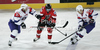 Thomas Koch (no.18) of Austria (M) between Ales Kranjc (no.28) of Slovenia (L) and Marcel Rodman (no.22) of Slovenia (R) during match of IIHF Ice hockey World championship Division 1 Group A between Slovenia and Austria. Match between Slovenia and Austria of IIHF Ice hockey World championship Division 1 Group A was held in Stozice Arena in Ljubljana, Slovenia, on Saturday, 21st of April 2012.
