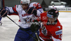 Robert Sabolic (no.25) of Slovenia (L) and Johannes Reichel (no.14) of Austria (R) during match of IIHF Ice hockey World championship Division 1 Group A between Slovenia and Austria. Match between Slovenia and Austria of IIHF Ice hockey World championship Division 1 Group A was held in Stozice Arena in Ljubljana, Slovenia, on Saturday, 21st of April 2012.
