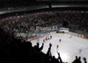 Spectators in arena celebrating goal of Slovenia during match of IIHF Ice hockey World championship Division 1 Group A between Slovenia and Austria. Match between Slovenia and Austria of IIHF Ice hockey World championship Division 1 Group A was held in Stozice Arena in Ljubljana, Slovenia, on Saturday, 21st of April 2012.
