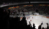 Spectators in arena celebrating goal of Slovenia during match of IIHF Ice hockey World championship Division 1 Group A between Slovenia and Austria. Match between Slovenia and Austria of IIHF Ice hockey World championship Division 1 Group A was held in Stozice Arena in Ljubljana, Slovenia, on Saturday, 21st of April 2012.
