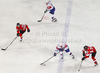 Marcel Rodman (no.22) of Slovenia (M), Ales Music (no.16) of Slovenia (2nd from L), Thomas Hundertpfund (no.27) of Austria (L) and Daniel Welser (no.20) of Austria (R) during match of IIHF Ice hockey World championship Division 1 Group A between Slovenia and Austria. Match between Slovenia and Austria of IIHF Ice hockey World championship Division 1 Group A was held in Stozice Arena in Ljubljana, Slovenia, on Saturday, 21st of April 2012.
