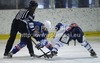 Players in bully trying to win puck during match of Rudi Hiti Ice hockey Summer league 2012 between VSV Villach and KHL Medvescak Zagreb. Match between VSV Villach and KHL Medvescak Zagreb was held in Bled Ice Arena in Bled, Slovenia, on Saturday, 18th of August 2012.
