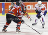 Anze Kopitar (no.11) of Slovenia (R) trying to get around Stefan Ulmer (no.7) of Austria (L) during match of EIHC Ice hockey tournament between Slovenia and Austria. Match between Slovenia and Austria was held in Ljubljana Hala Tivoli arena, Slovenia, on Saturday, 10th of November 2012.
