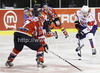 Anze Kopitar (no.11) of Slovenia (R) trying to get around Stefan Ulmer (no.7) of Austria (L) during match of EIHC Ice hockey tournament between Slovenia and Austria. Match between Slovenia and Austria was held in Ljubljana Hala Tivoli arena, Slovenia, on Saturday, 10th of November 2012.
