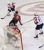 Jan Mursak (no.39) of Slovenia (L) and Anze Kopitar (no.11) of Slovenia (R) in front of goalie Bernhard Starkbaum (no.29) of Austria during match of EIHC Ice hockey tournament between Slovenia and Austria. Match between Slovenia and Austria was held in Ljubljana Hala Tivoli arena, Slovenia, on Saturday, 10th of November 2012.
